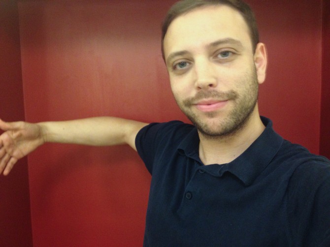 alex eisenberg pretending to pose with someone